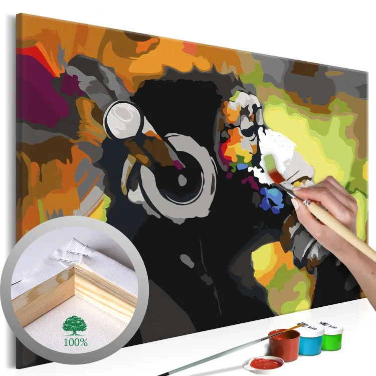 Macaco colorido com auscultadores