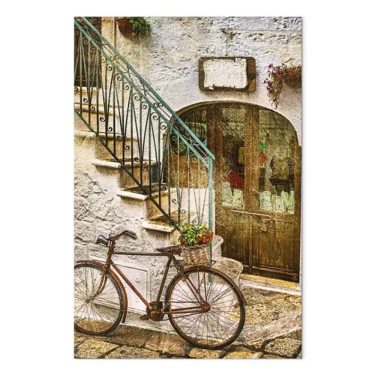 Bicicleta junto à escadaria de pedra - foto de uma cidade italiana