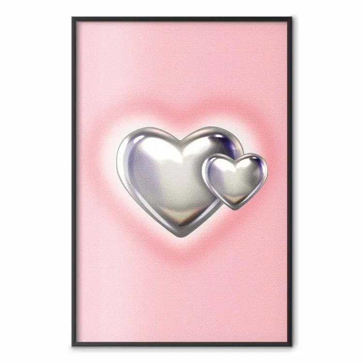 Amor metálico - corações prateados sobre um fundo cor-de-rosa suave com um efeito de desfocagem