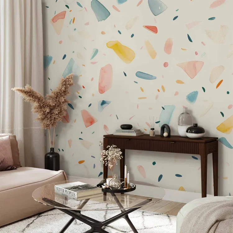 Terrazzo aguarelado - fragmentos coloridos num fundo claro criam um padrão semelhante a uma pintura